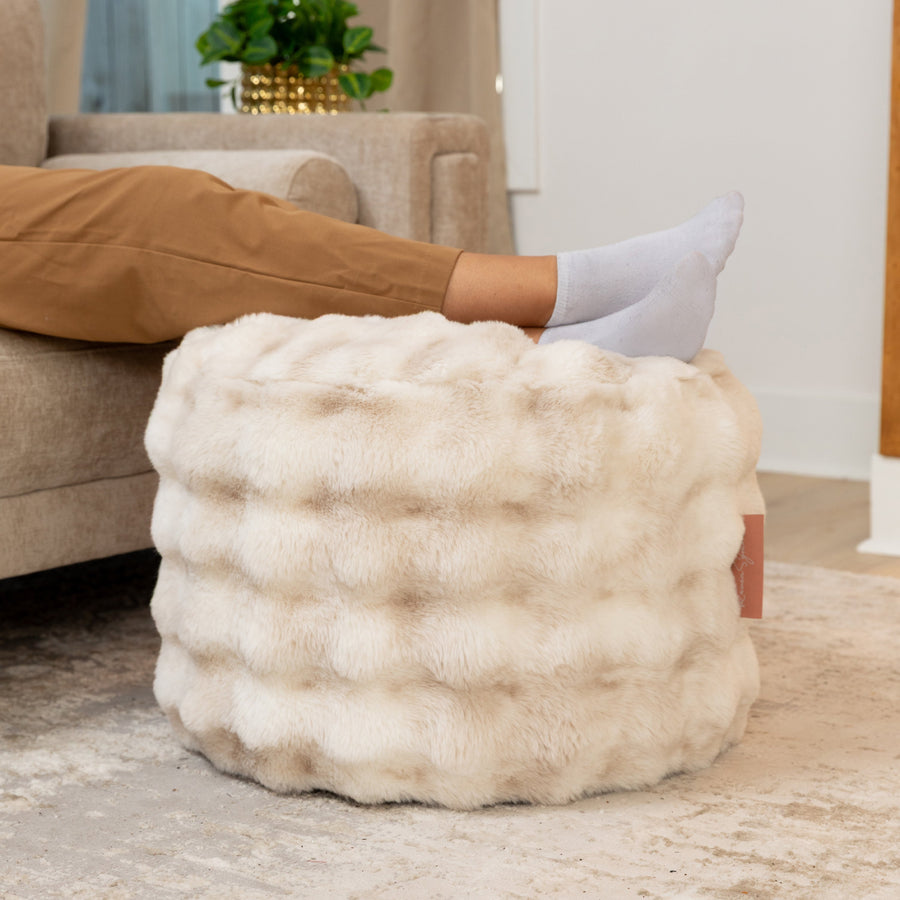 Raven Round Ottoman by Raven-Symoné in Phantom Cream Faux Fur