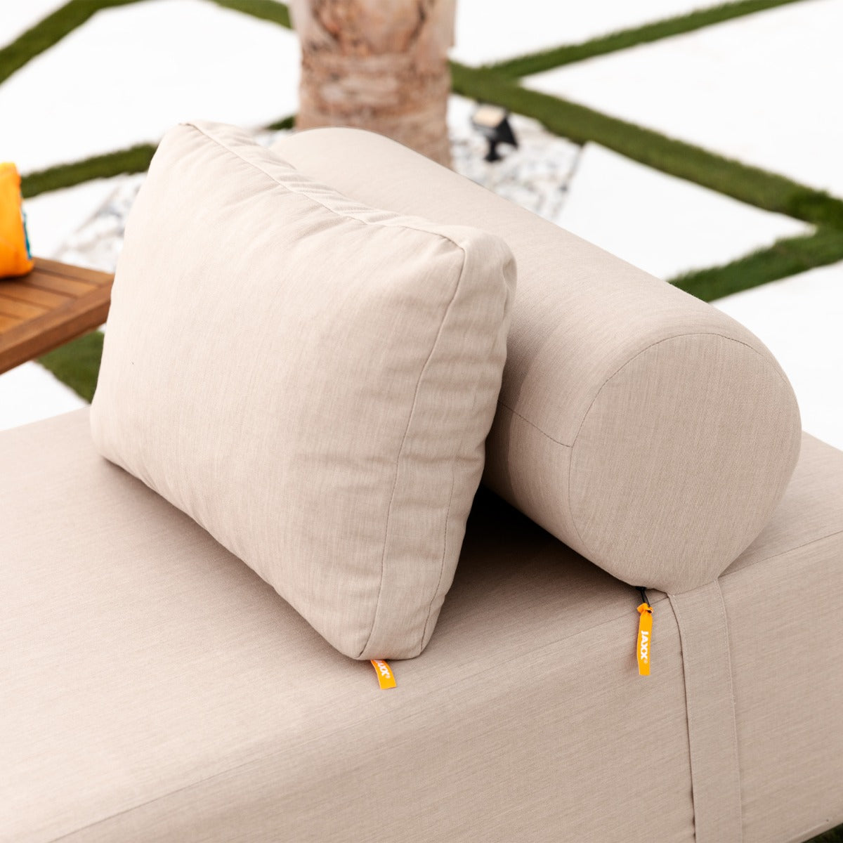 Close up shot of the Alvy Outdoor Daybed Lounger pillows in flax