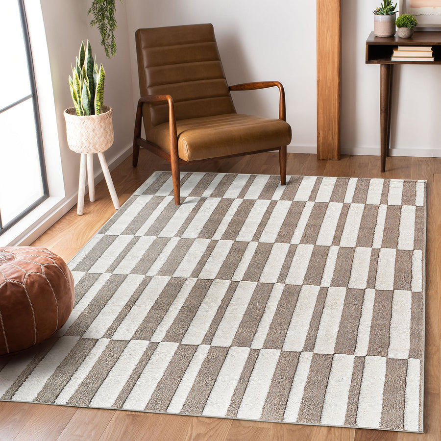 Beige and cream broken stripe rug in a living room