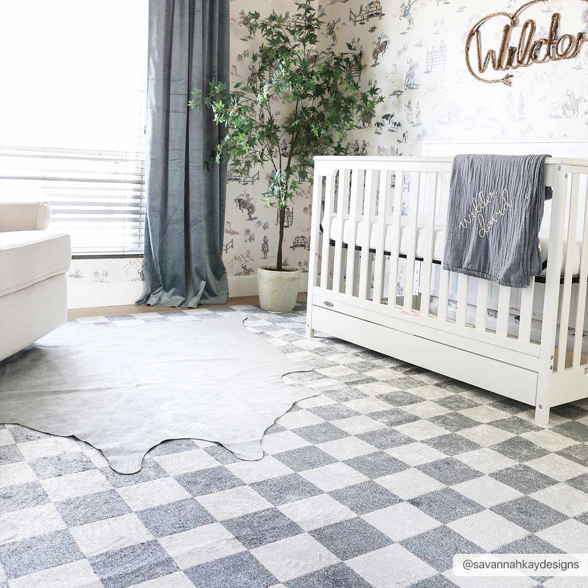 Alie checkered rug in a nursery