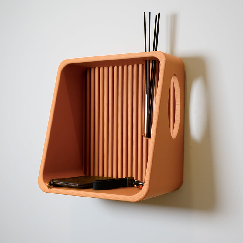 Ribbed Wall Shelf in terracotta with reeds