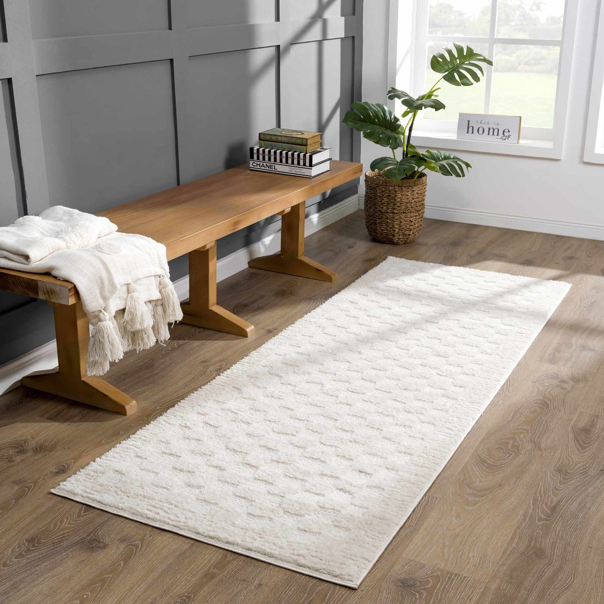 Ivory checkered runner beside a wood bench