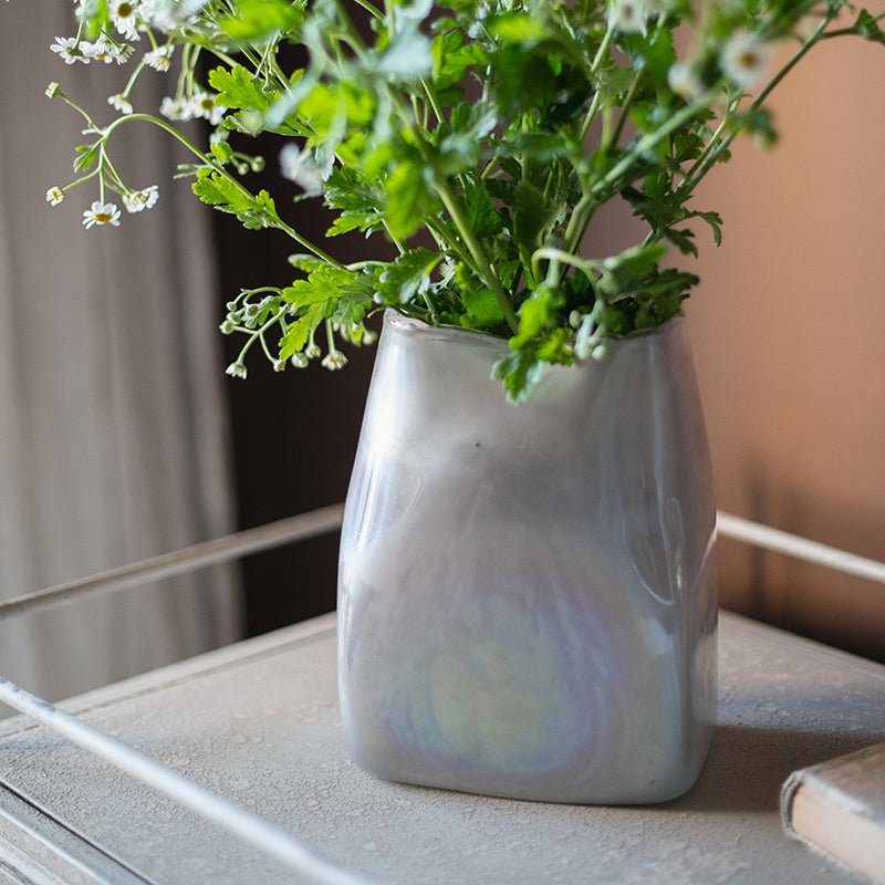 Gradient Art Vase with greenery on a side table