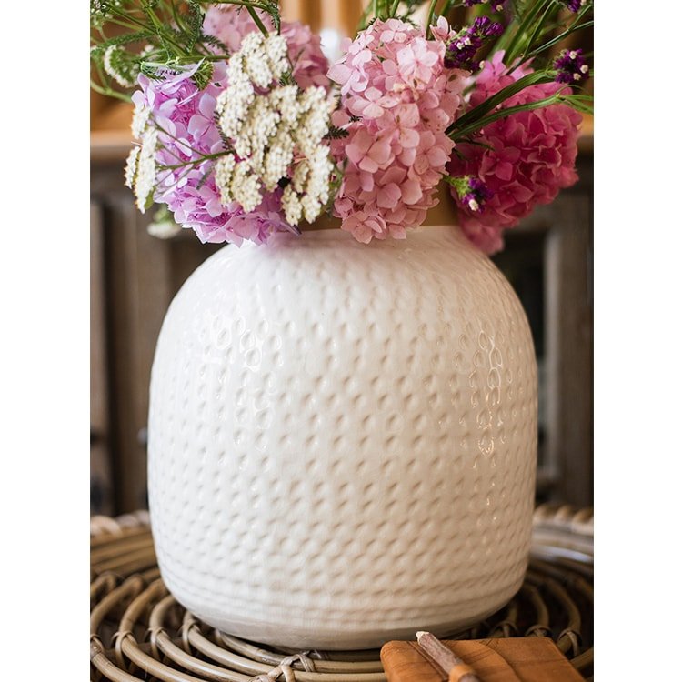White Glazed Ceramic Vase with a full bouquet