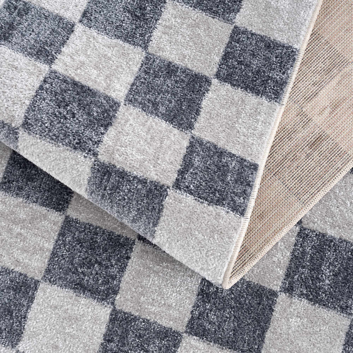 Close-up of the Alie gray and ivory checks