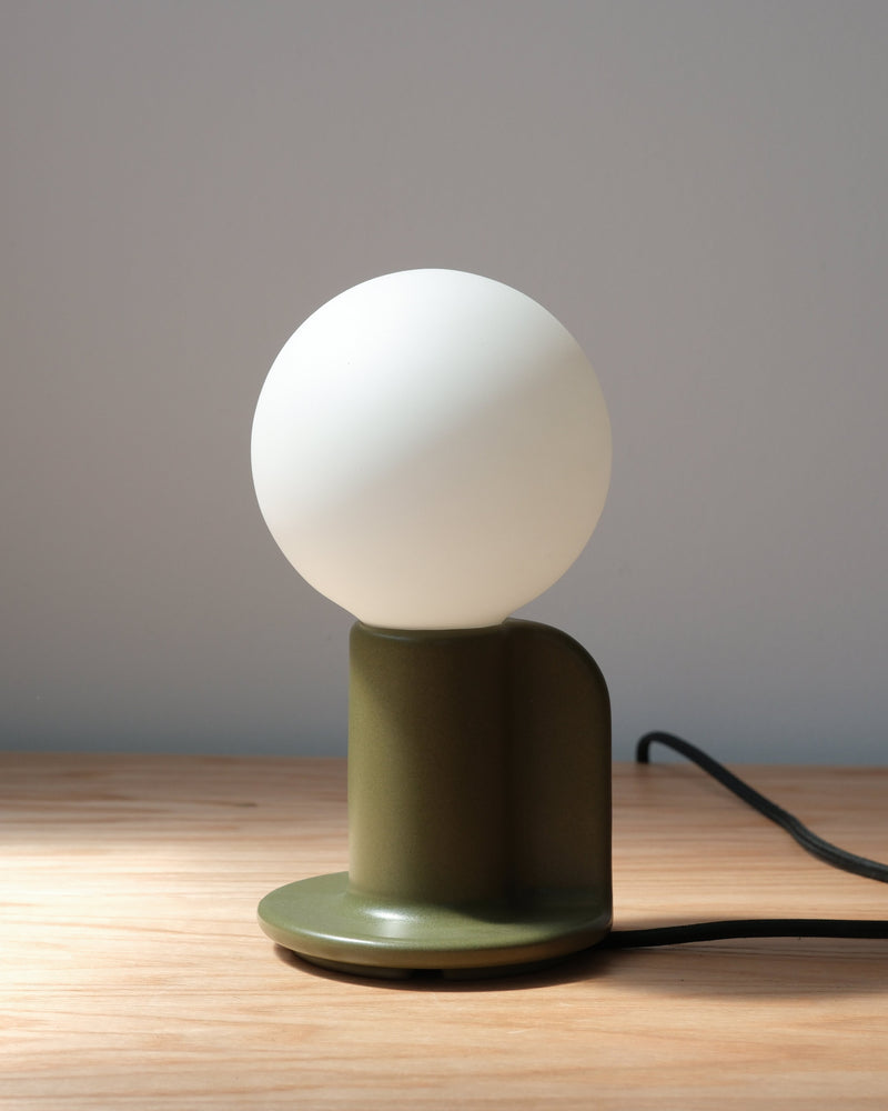 Q Lamp in moss green, side view