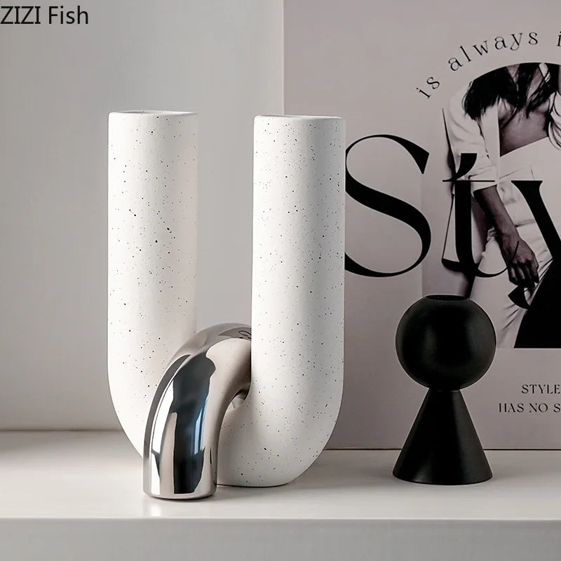 U-Shaped Ceramic Vase in white on a shelf