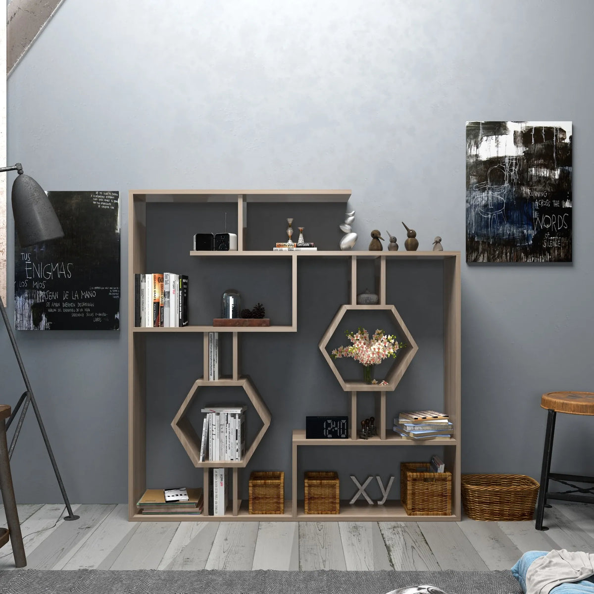 Gray Tamara bookcase against a blue wall