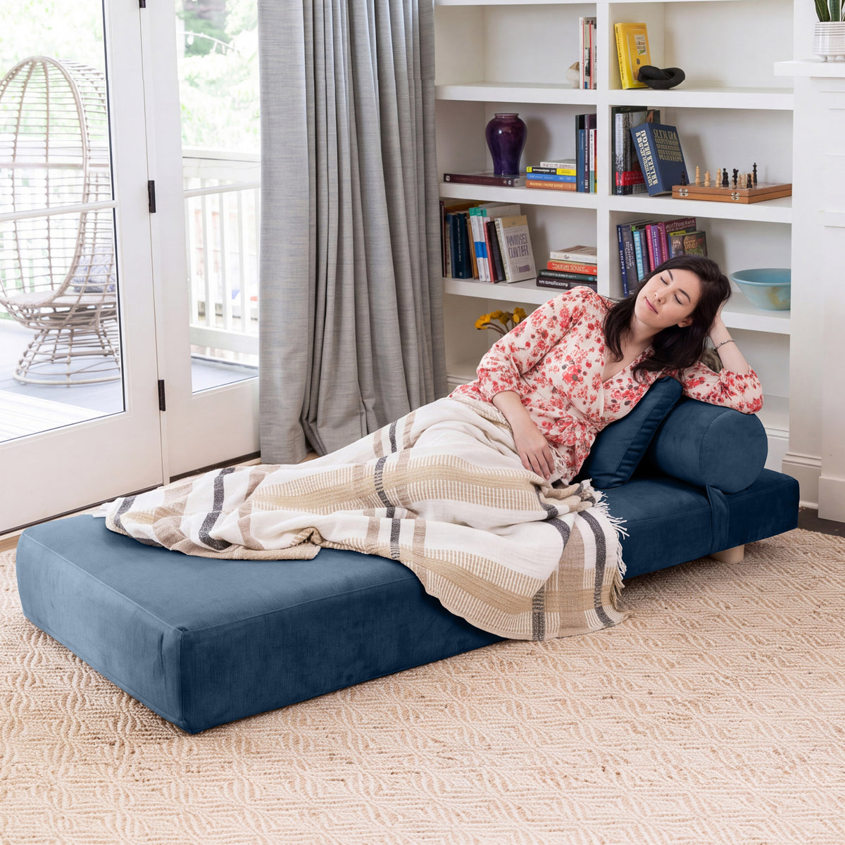 Avida Chair in Indigo Microvelvet, unfolded for a nap
