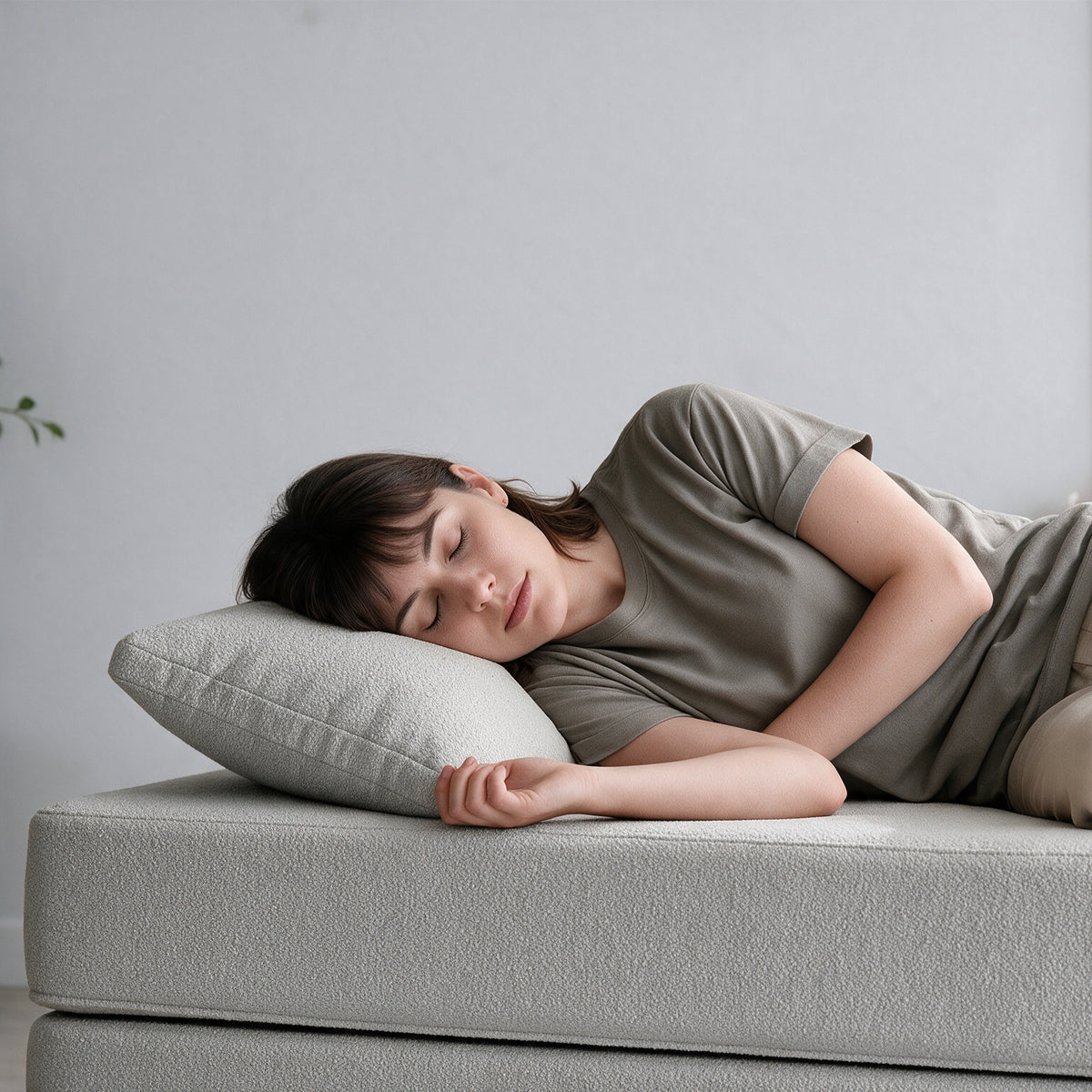 Avida Pillow Refresh in Dark Gray Boucle as a pillow for napping on the Avida Daybed