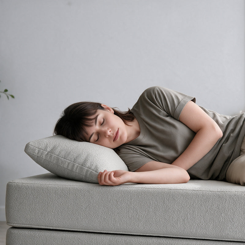 Avida Pillow Refresh in Dark Gray Boucle as a pillow for napping on the Avida Daybed