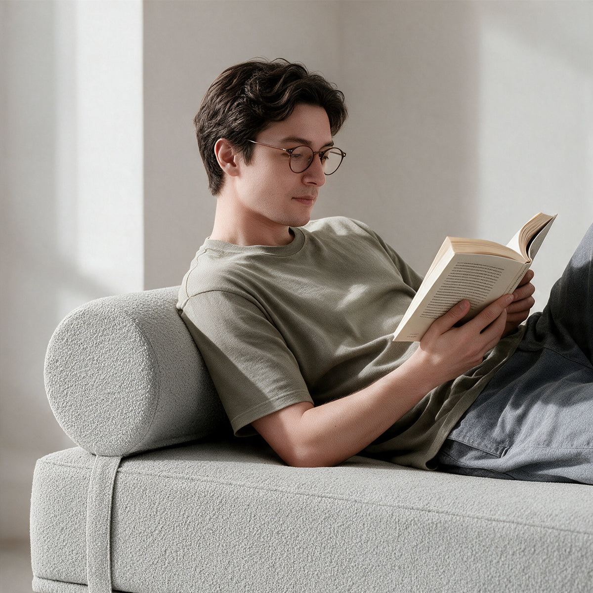 Avida Bolster Refresh in Dark Gray Boucle as a backrest for reading