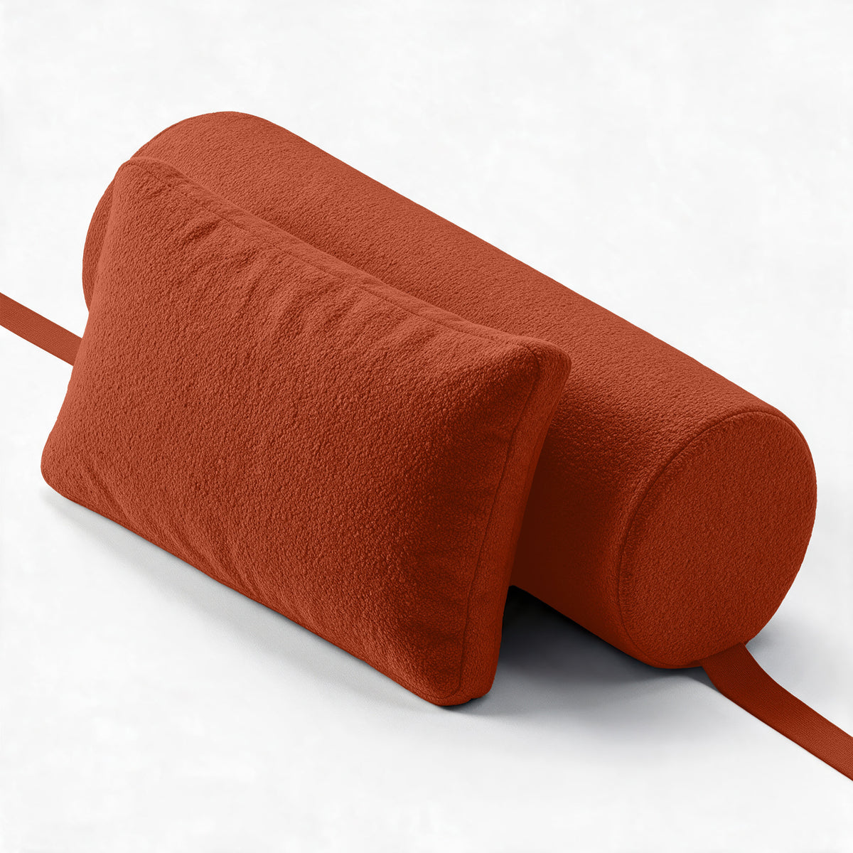 Avida Bolster and Pillow Refresh together in Terra Cotta Boucle