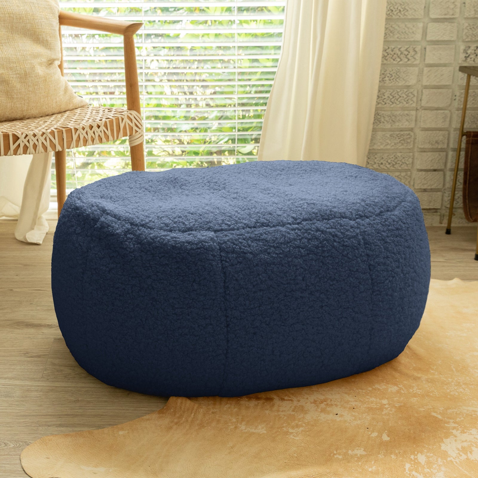 Ellis Ottoman large in blue in sunroom