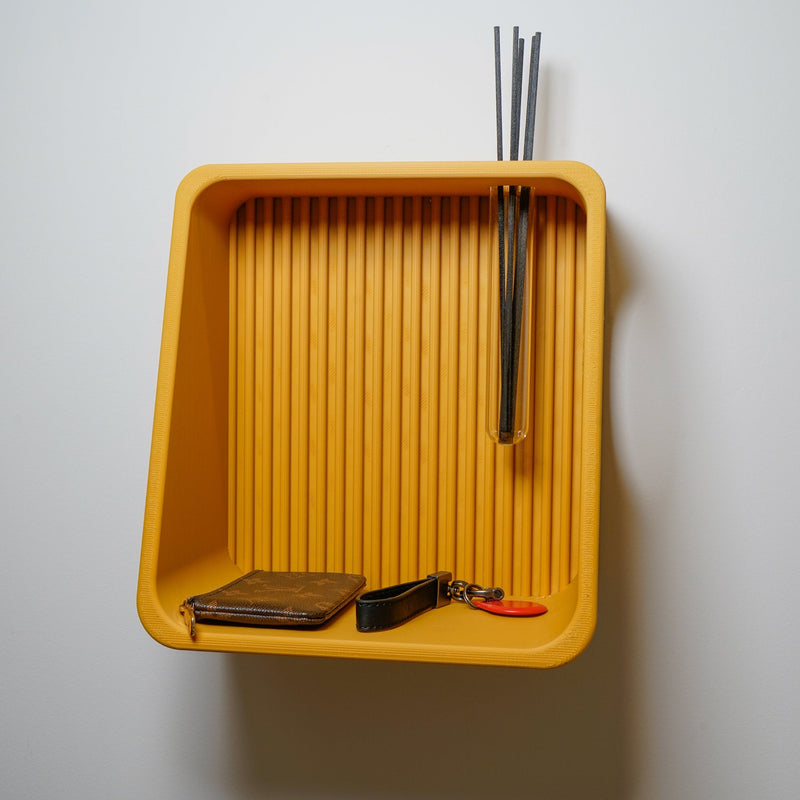 Ribbed Wall Shelf in mustard with reeds