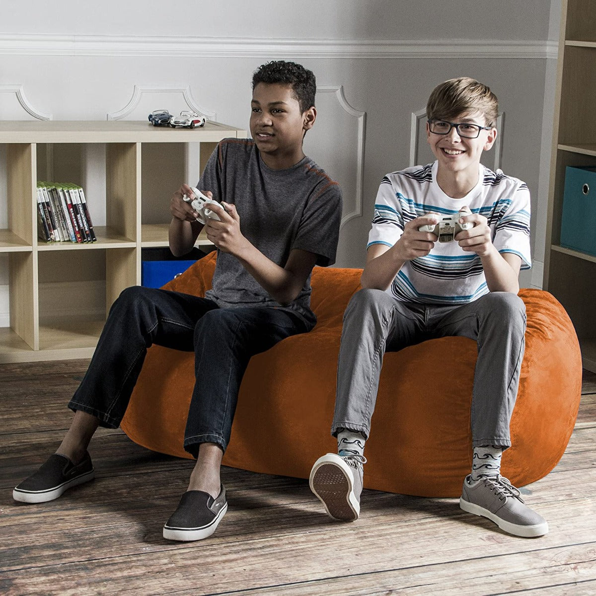 Two boys playing video games on Lounger 4’ Kids Bean Bag