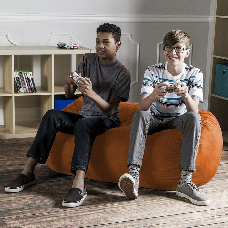 Two boys playing video games on Lounger 4’ Kids Bean Bag