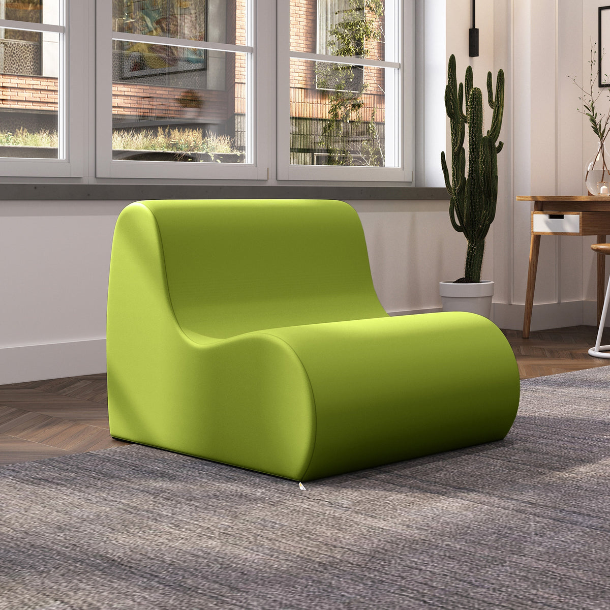 Midtown chair in green in a living room