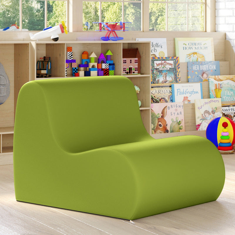 Green children's chair in a playroom with books and toys.