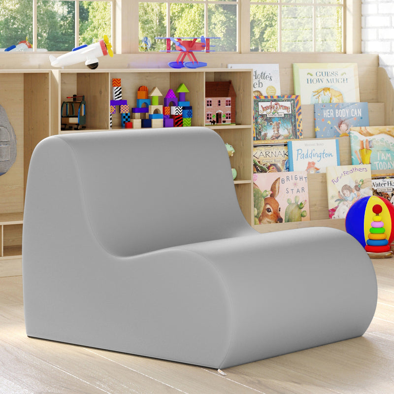 Gray children's chair in a playroom with books and toys.