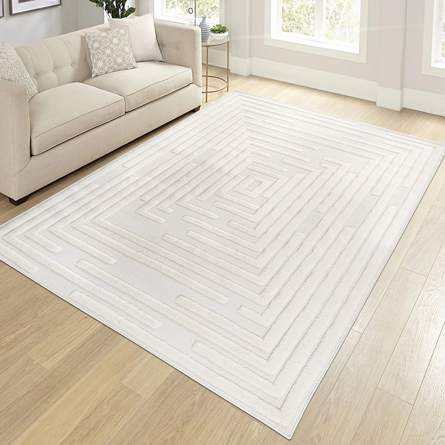 Cream geometric rug in a living room with a cream sofa