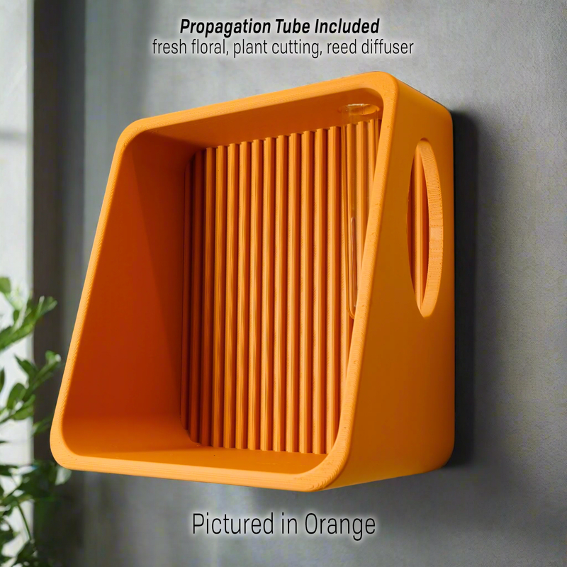 Ribbed Wall Shelf in orange with the propagation tube