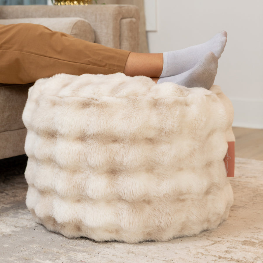 Raven Round Ottoman by Raven-Symoné in Phantom Cream Faux Fur