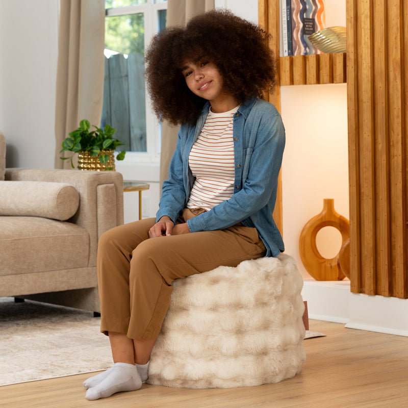 Raven Round Ottoman by Raven-Symoné in Phantom Cream Faux Fur