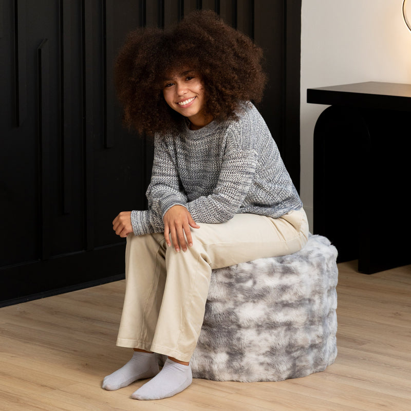 Raven Round Ottoman by Raven-Symoné in Phantom Gray Faux Fur