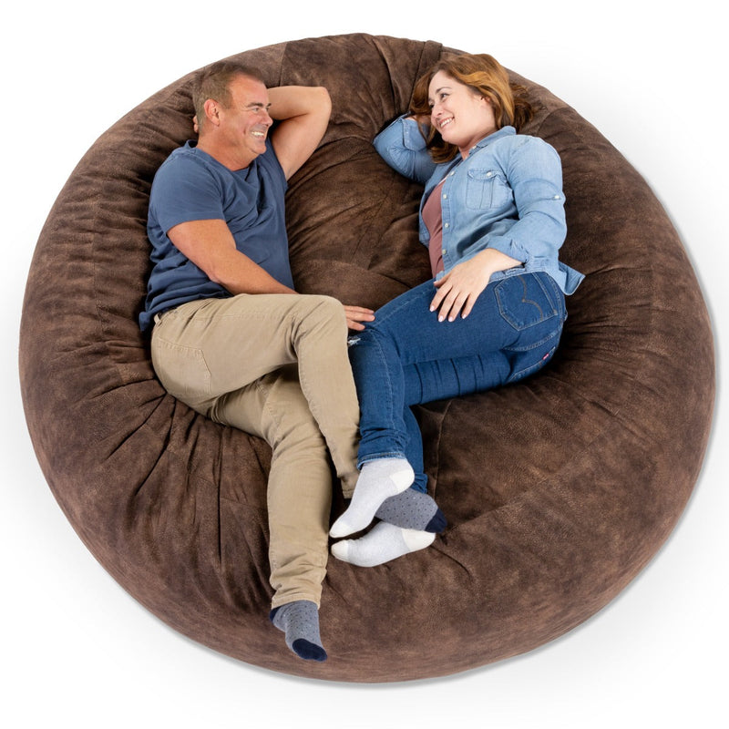 Couple relaxing on the Jaxx Saxx 6 in Faux Hide Fabric