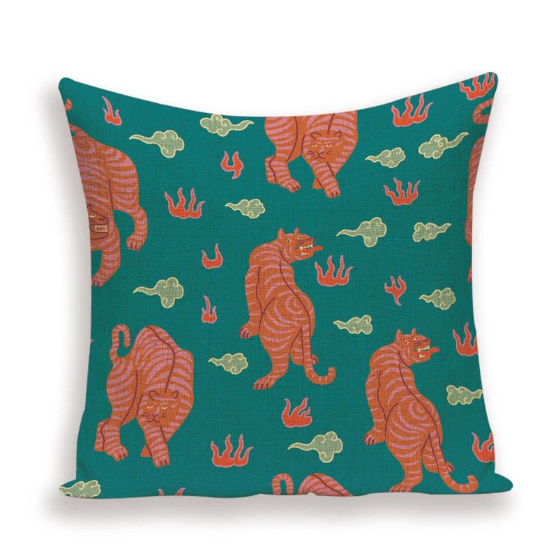 Pillow cover with tigers on a teal jungle print