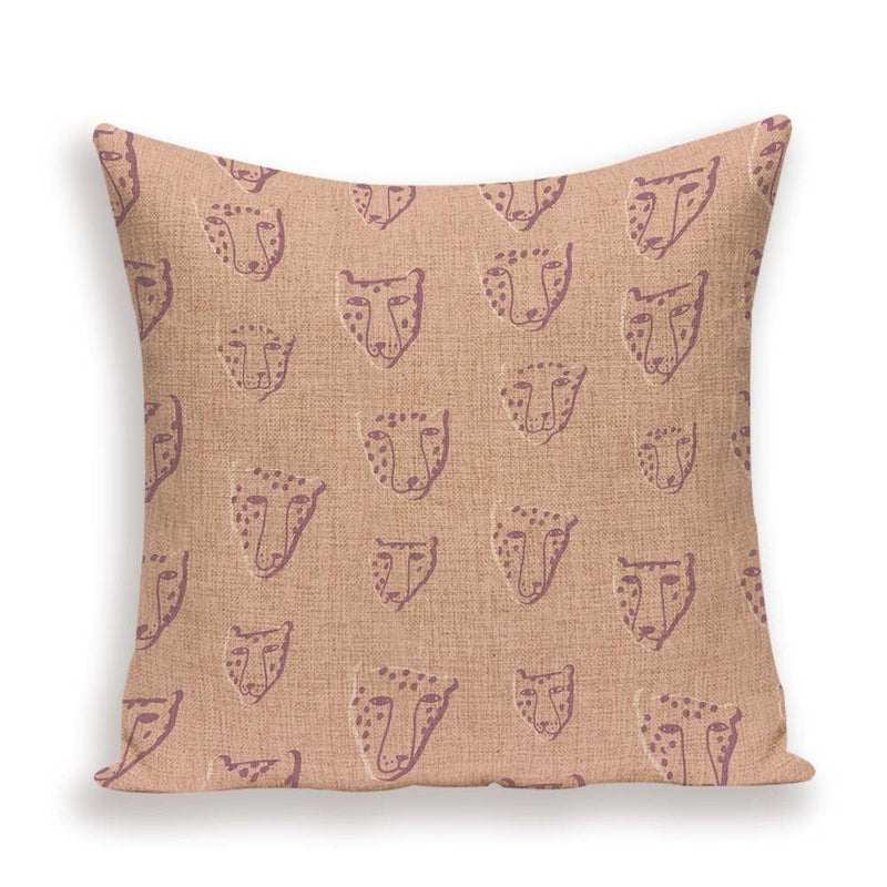 Pillow cover with a subtle tiger pattern on tan
